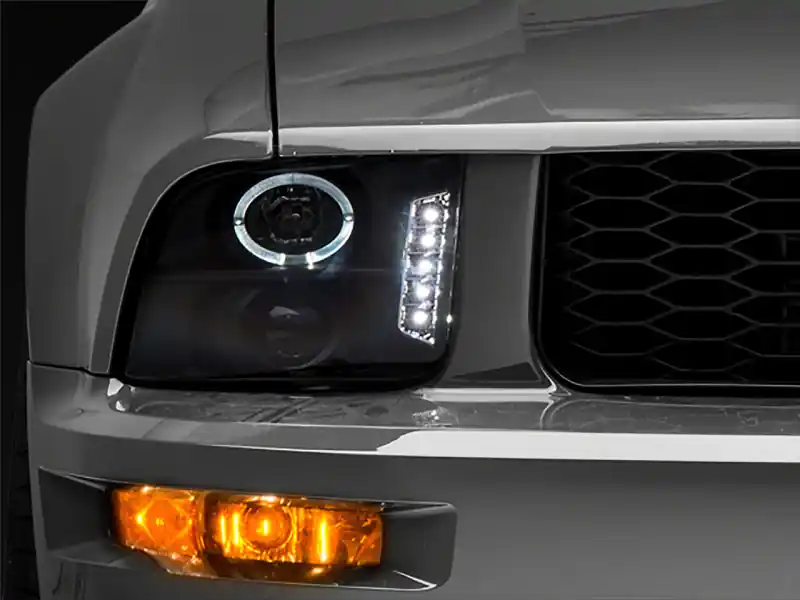 Raxiom 05-09 Ford Mustang Excluding GT500 LED Halo Projector Headlights- Blk Housing (Clear Lens) (RAX101683)