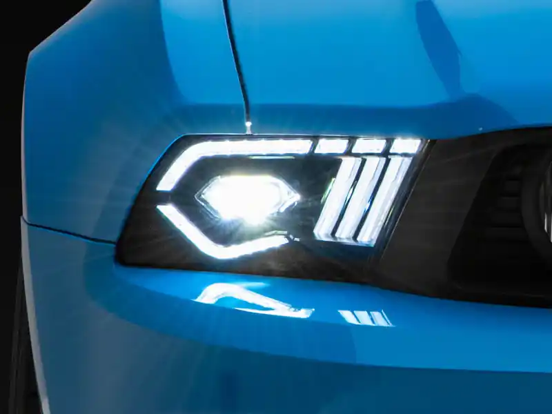 Raxiom 10-12 Ford Mustang w/ Factory Halogen LED Projector Headlights- Blk Housing (Clear Lens) (RAX422461)