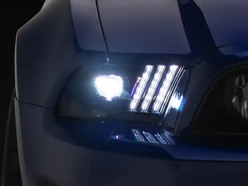 Raxiom 13-14 Ford Mustang LED Projector Headlights SEQL Turn Signals- Blk Housing (Clear Lens) (RAX426686)