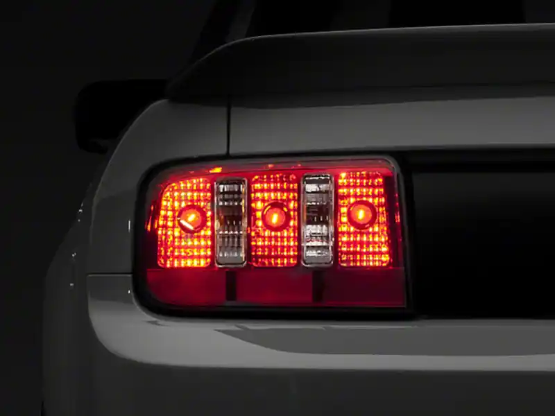 Raxiom 05-09 Ford Mustang Coyote Tail Lights- Chrome Housing - Red/Clear Lens (RAX49123)