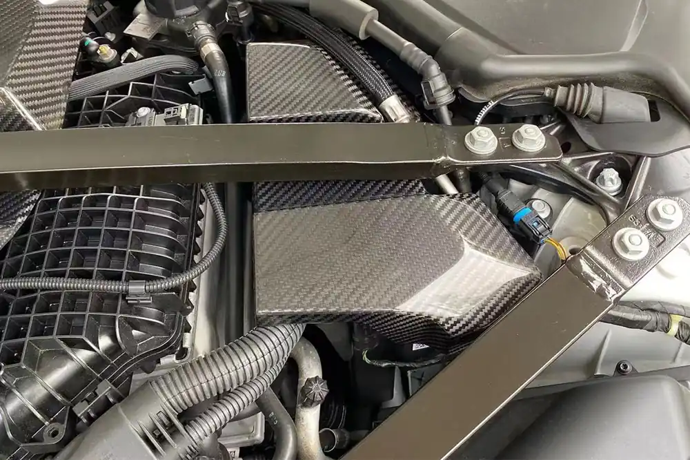 Carbonado 2021-UP BMW M3 G80 M4 G82 G83 Dry Carbon Fiber Fuse Cover