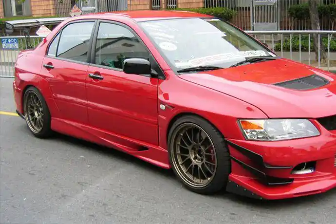 Carbonado JP Style Side Skirts | 2003-2006 Mitsubishi Evo 7/8/9