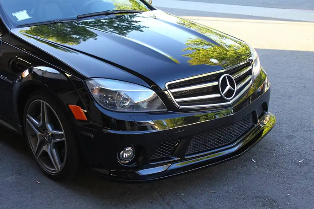 Carbonado 2008-2011 Mercedes Benz W204 C63 AMG ARKYM STYLE CARBON FRONT LIP