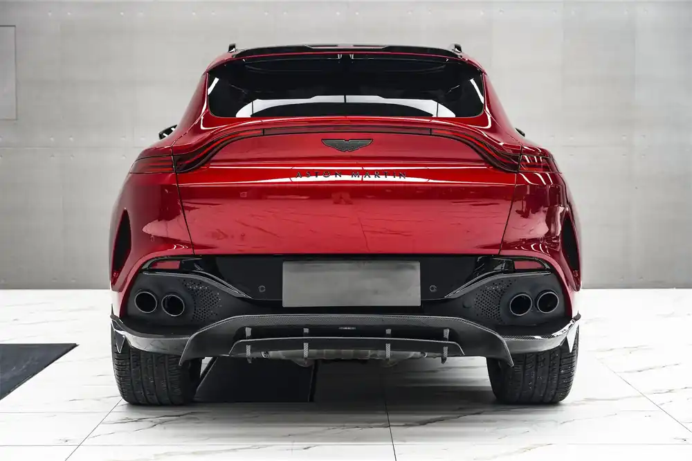 Carbonado 2021-2024 Aston Martin DBX 707 Style Dry Carbon Fiber Rear Bumper with Exhaust tips