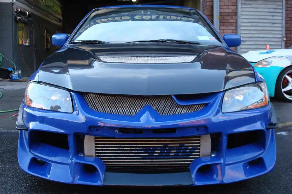 Carbonado JC Style Front Bumper | 2003-2006 Mitsubishi Evo 7/8/9