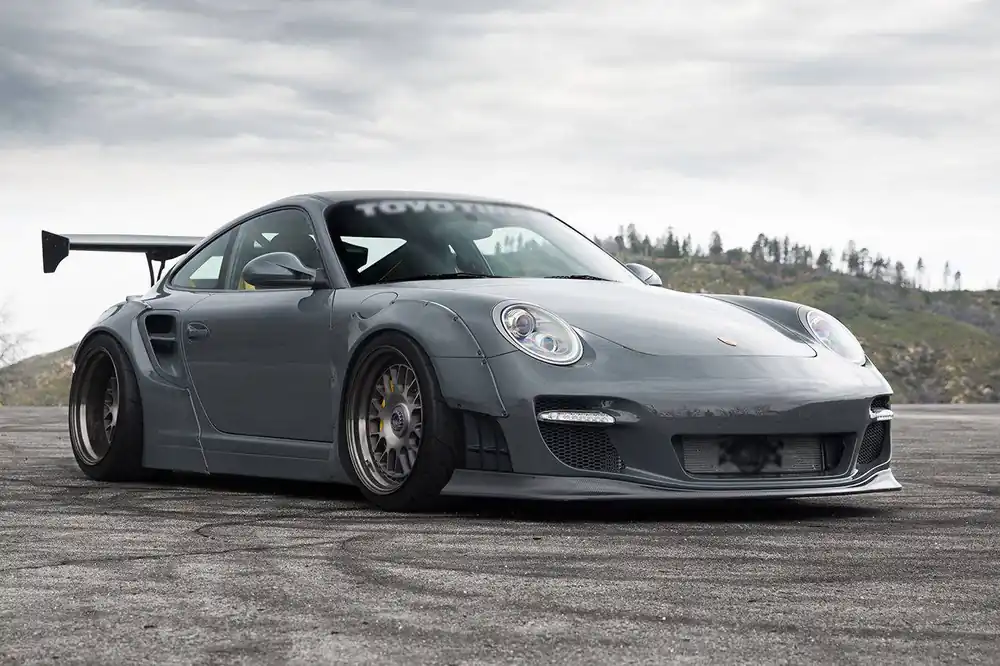 Carbonado 2009-2012 Porsche 911 997.2 TurboS 4S DE Style Auto Full Wide Body Kit
