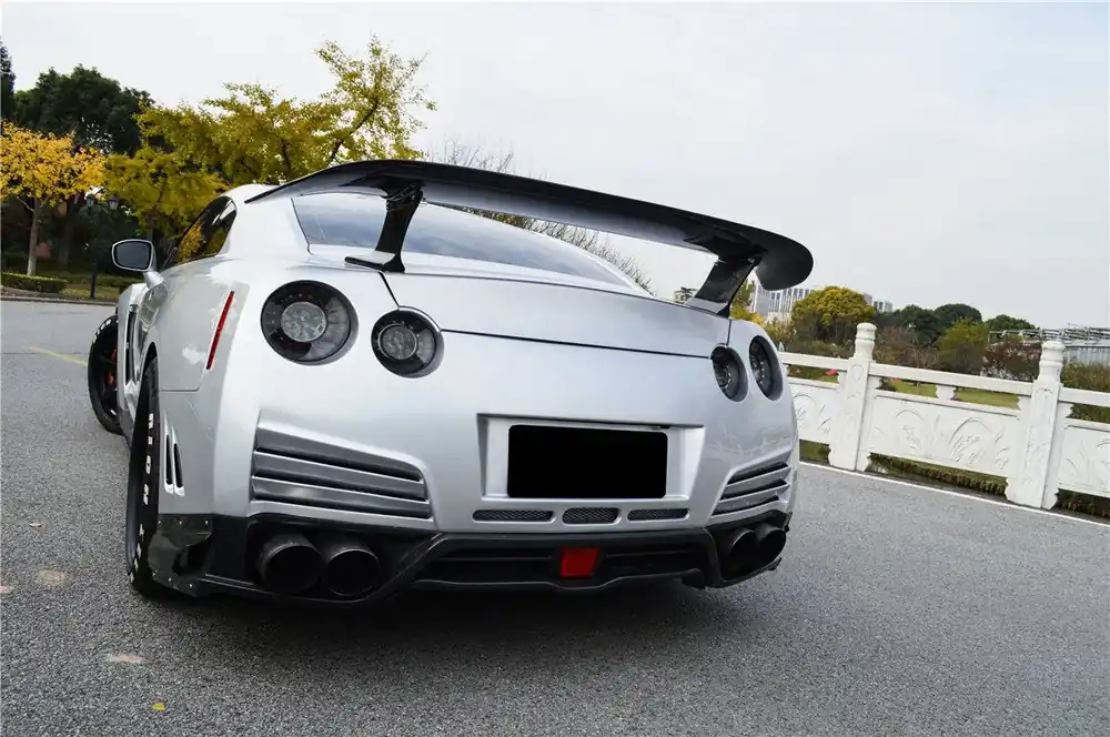 Carbonado 2008-2016 Nissan GTR R35 CBA DBA VA Style Rear Bumper w/ Lip