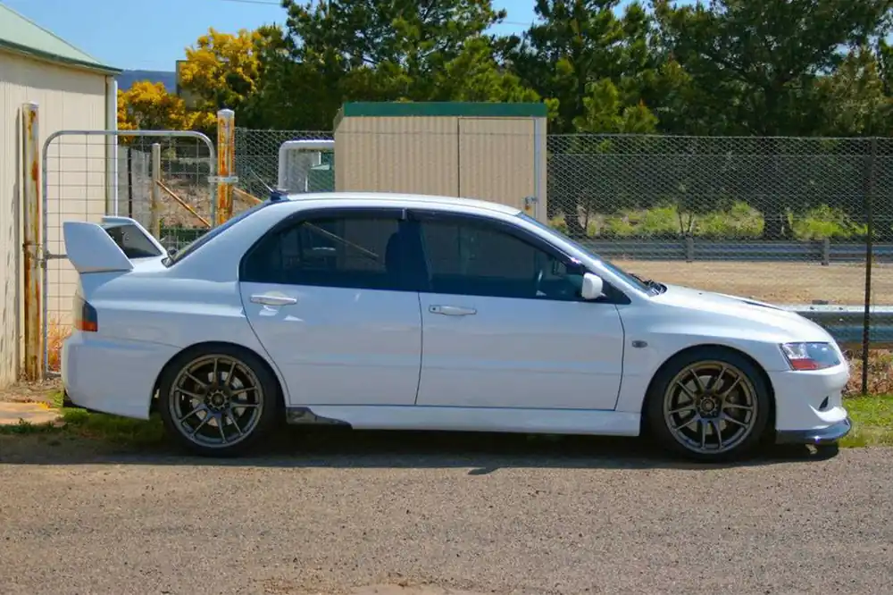 Carbonado OE Style Carbon Fiber Fender | 2003-2006 Mitsubishi Evo 7/8/9