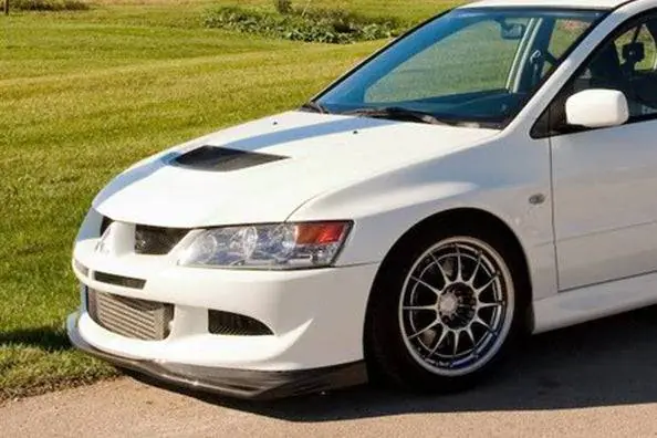 Carbonado TS Style Carbon Fiber Front Lip | 2003-2006 Mitsubishi Evo 7/8/9