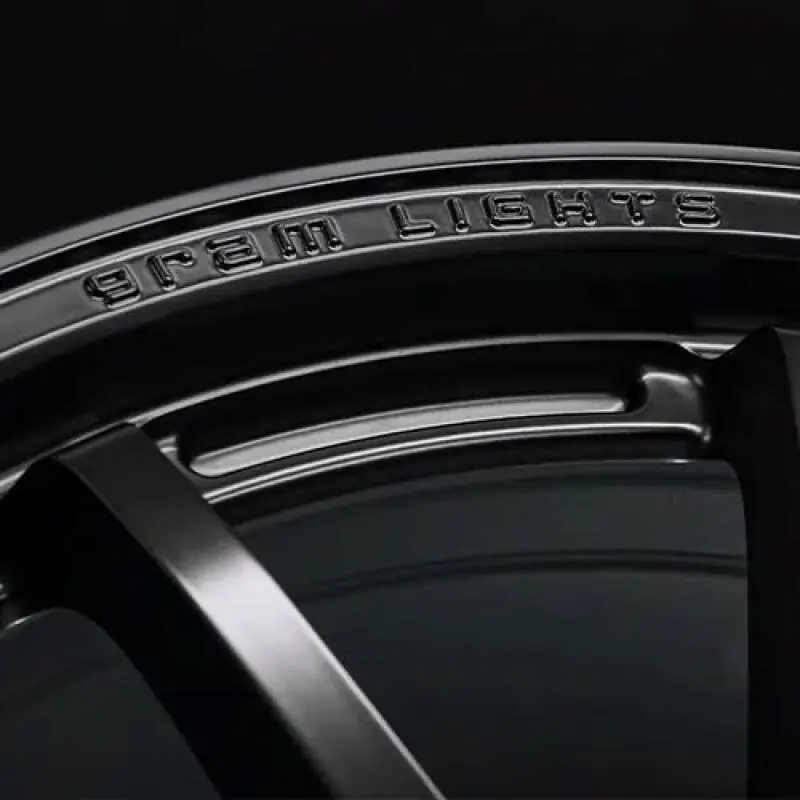 Gram Lights 57NR LIMITED II 18x7.5 +38 5-114.3 Semigloss Black Wheel w/ Black Cap/Stickers/Air Valve